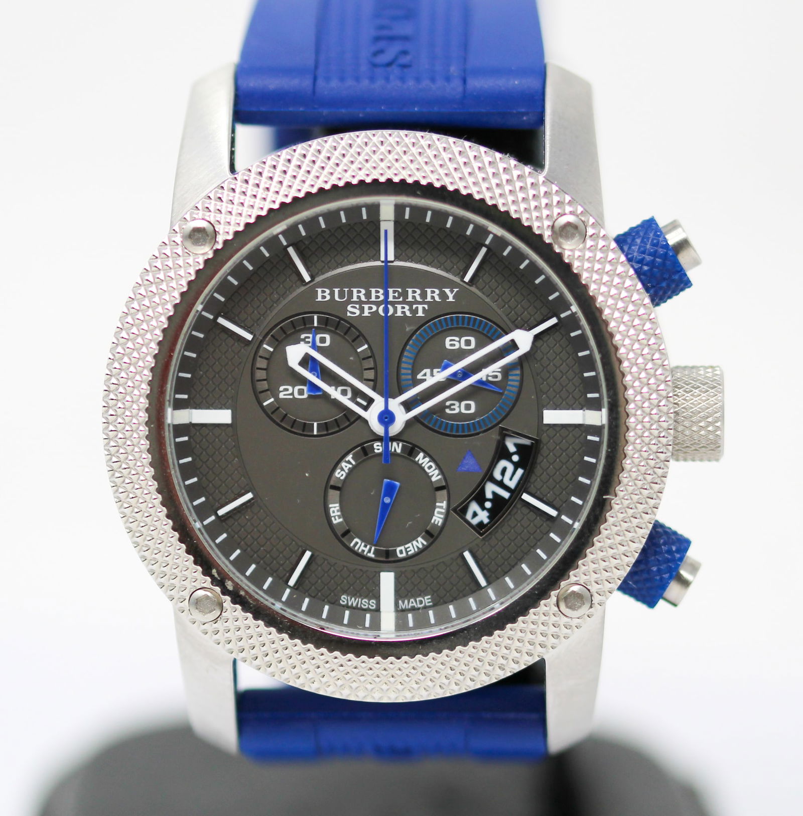 Burberry Sport Chronograph Wristwatch with Date Wristwatch: Stainless Steel Burberry Sport Chronograph Wristwatch with Date Wristwatch on Rubber Burberry Strap; Ref BU7711, Serial # 12045. 44mm diameter. Not running. PLEASE NOTE: all wristwatches are sold "as-