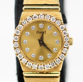 Vintage Ladies Piaget Wristwatch with Factory Diamond Dial and Bezel in 18k Yellow Gold *Hands Do