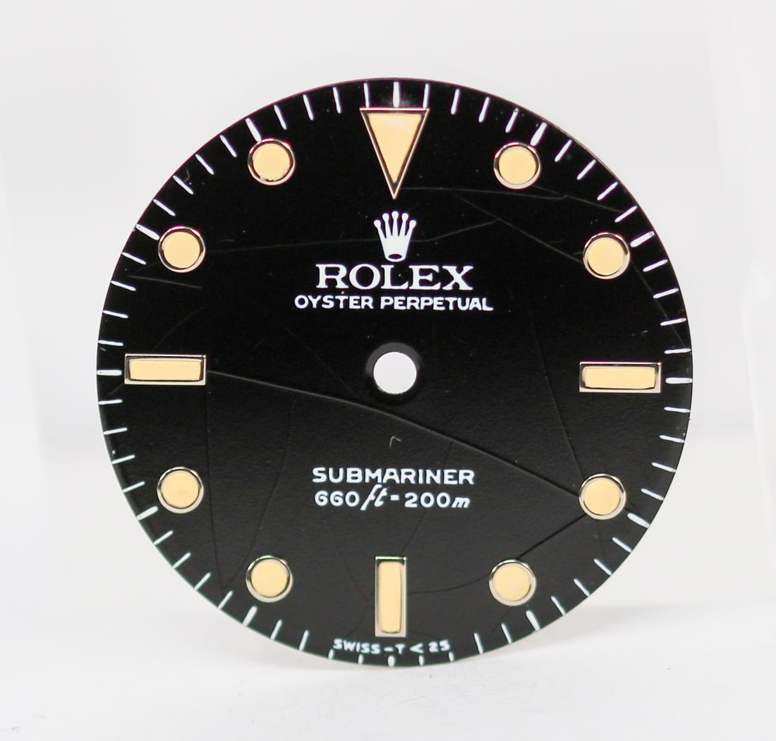 Loose Vintage Rolex Oyster Perpetual Submariner Dial *Visible Scratches on Dial*: Loose Vintage Rolex Oyster Perpetual Submariner Dial *Visible Scratches on Dial*. Black dial. 26mm diameter. Loose watch parts. PLEASE NOTE: all wristwatches are sold "as-is", with no mechanical warra