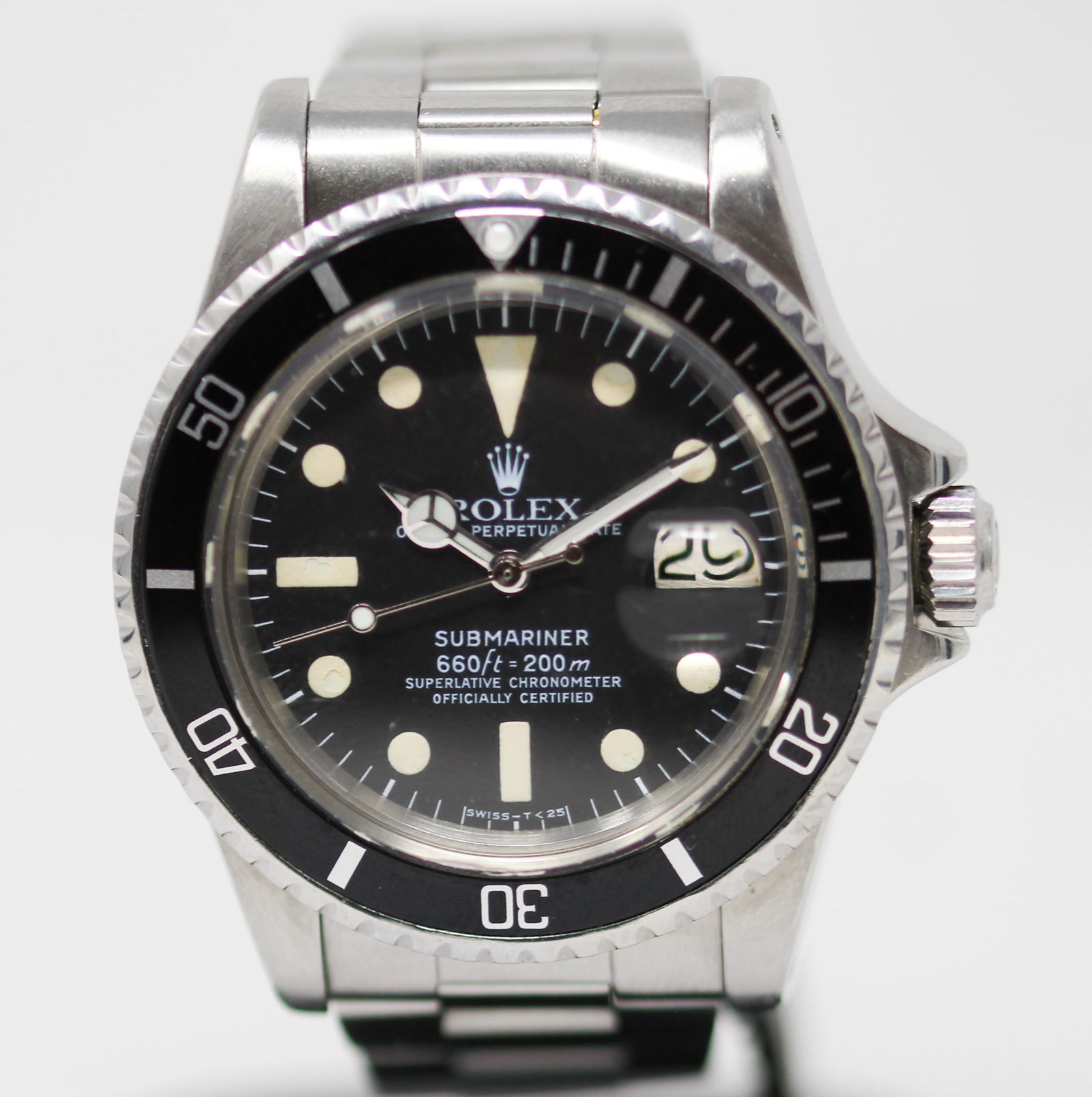 Vintage Rolex Oyster Perpetual Date Submariner Wristwatch: Stainless Steel Vintage Rolex Oyster Perpetual Date Submariner Wristwatch on Stainless Steel Rolex Bracelet; Model 1680, Serial # 5257244. 40mm diameter. Running at time of cataloging. PLEASE NOTE: al