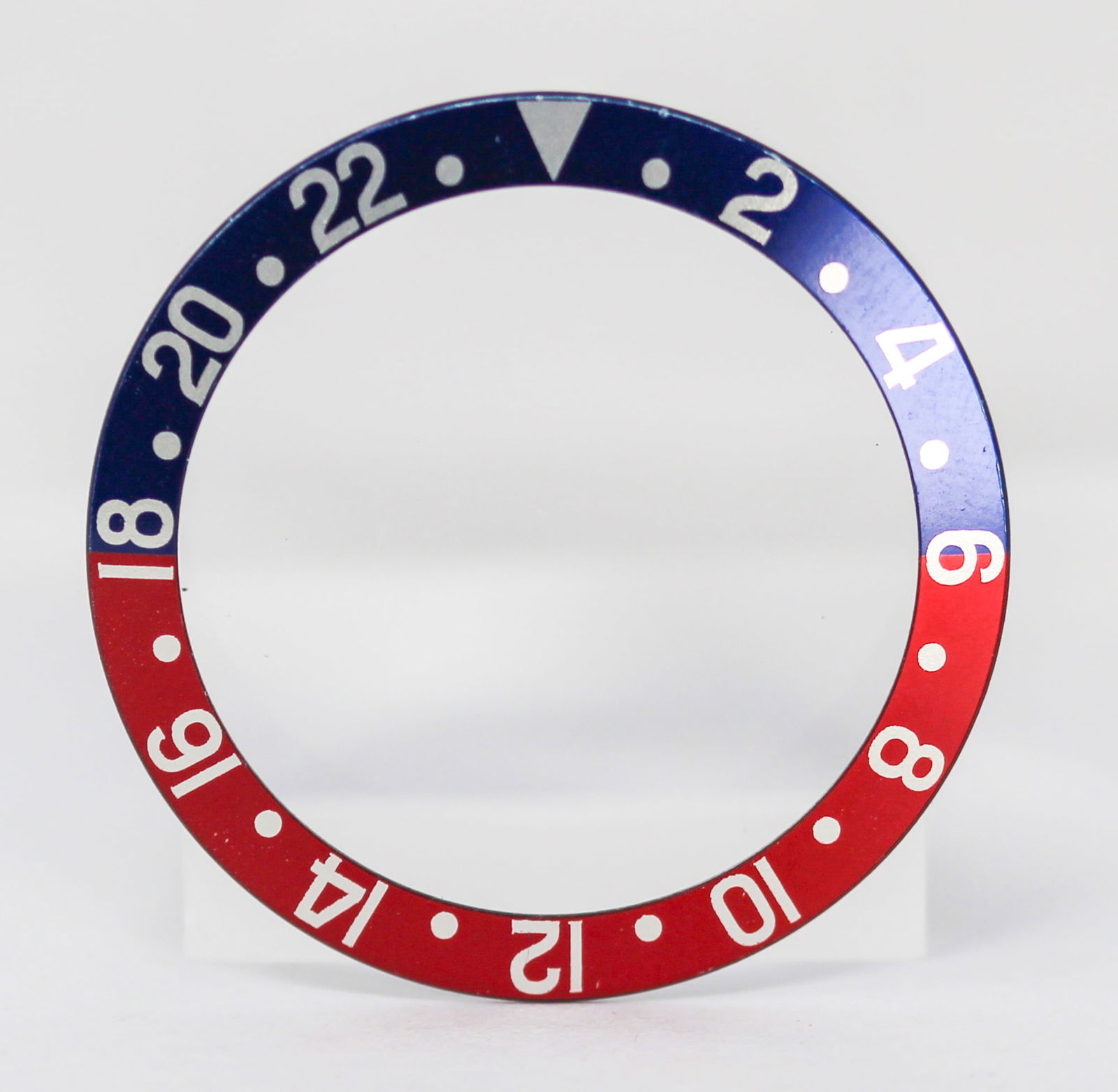 Loose Vintage Rolex GMT-Master Bezel: Loose Vintage Rolex GMT-Master Bezel. Blue and red bezel. 38mm diameter. Loose watch parts. PLEASE NOTE: all wristwatches are sold "as-is", with no mechanical warranty or guarantee. Any representation