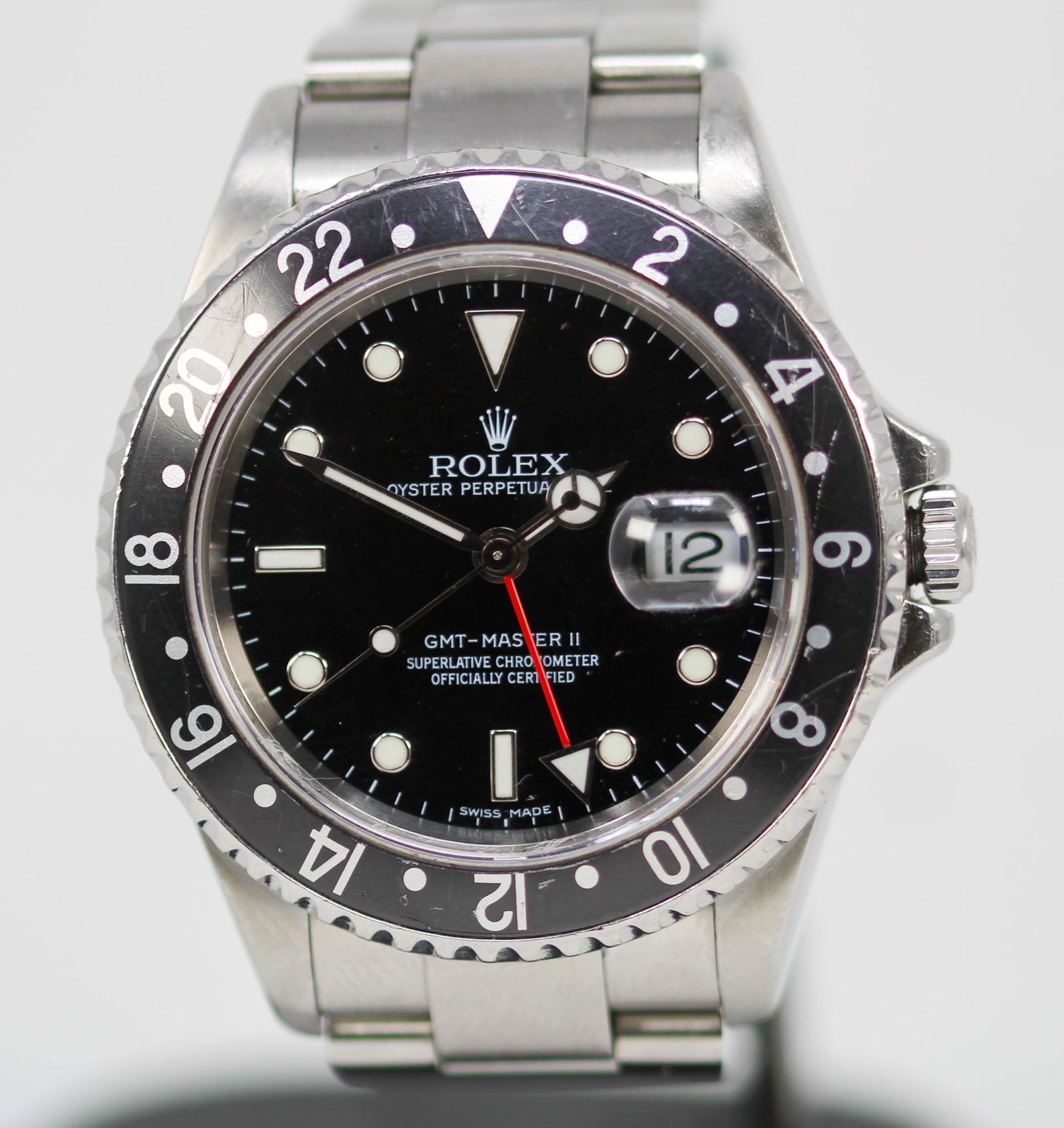Vintage Rolex Oyster Perpetual Date GMT-Master II Wristwatch: Stainless Steel Vintage Rolex Oyster Perpetual Date GMT-Master II Wristwatch on Stainless Steel Rolex Bracelet; Model 16710, Serial # D897299. 40mm diameter. Running at time of cataloging. PLEASE NOTE