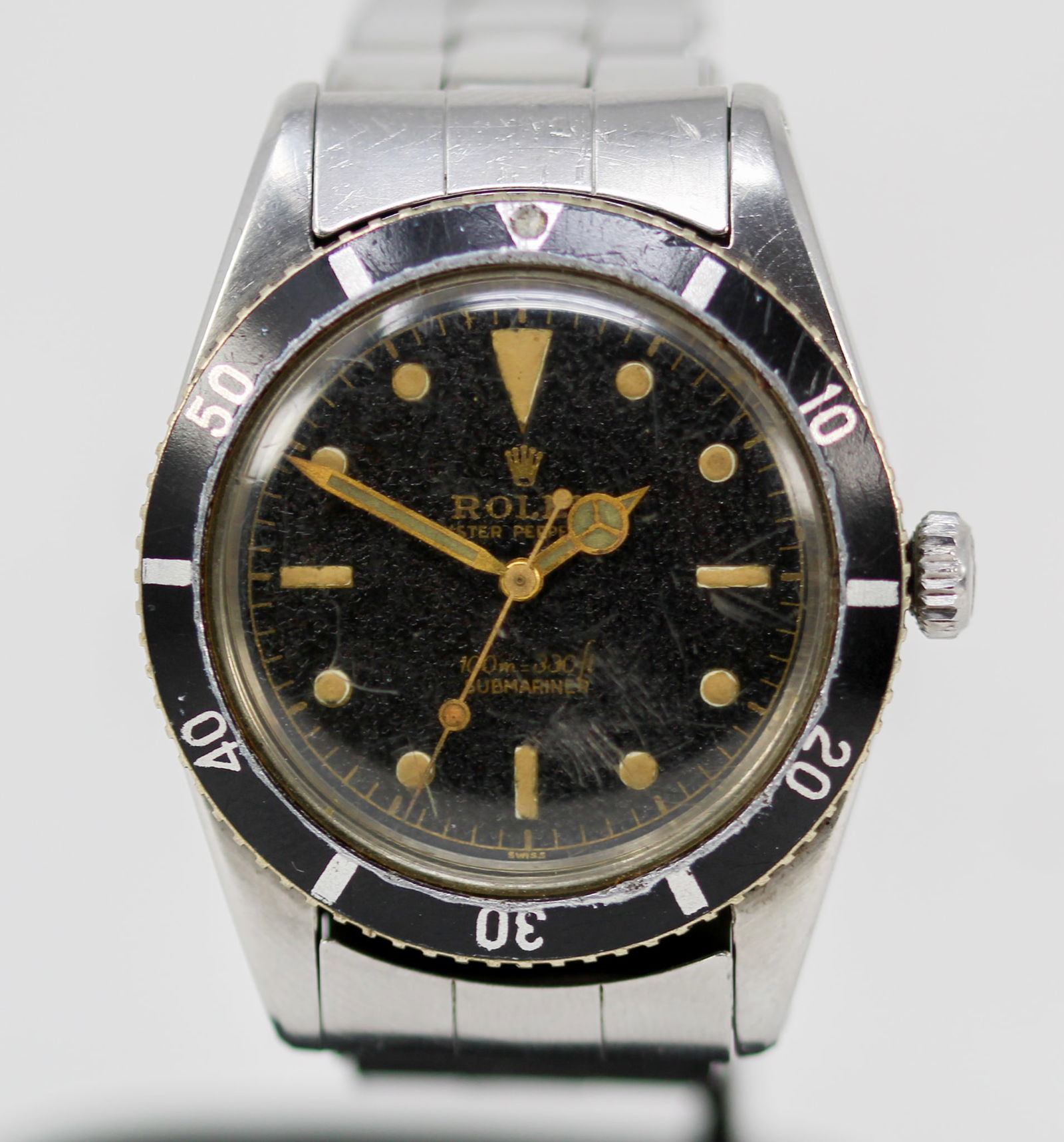 Vintage Rolex Oyster Perpetual Submariner Wristwatch: Stainless Steel Vintage Rolex Oyster Perpetual Submariner Wristwatch on Stainless Steel Rolex Bracelet; Model 6536-1, Serial # 112106. 37mm diameter. Running at time of cataloging. PLEASE NOTE: all wr