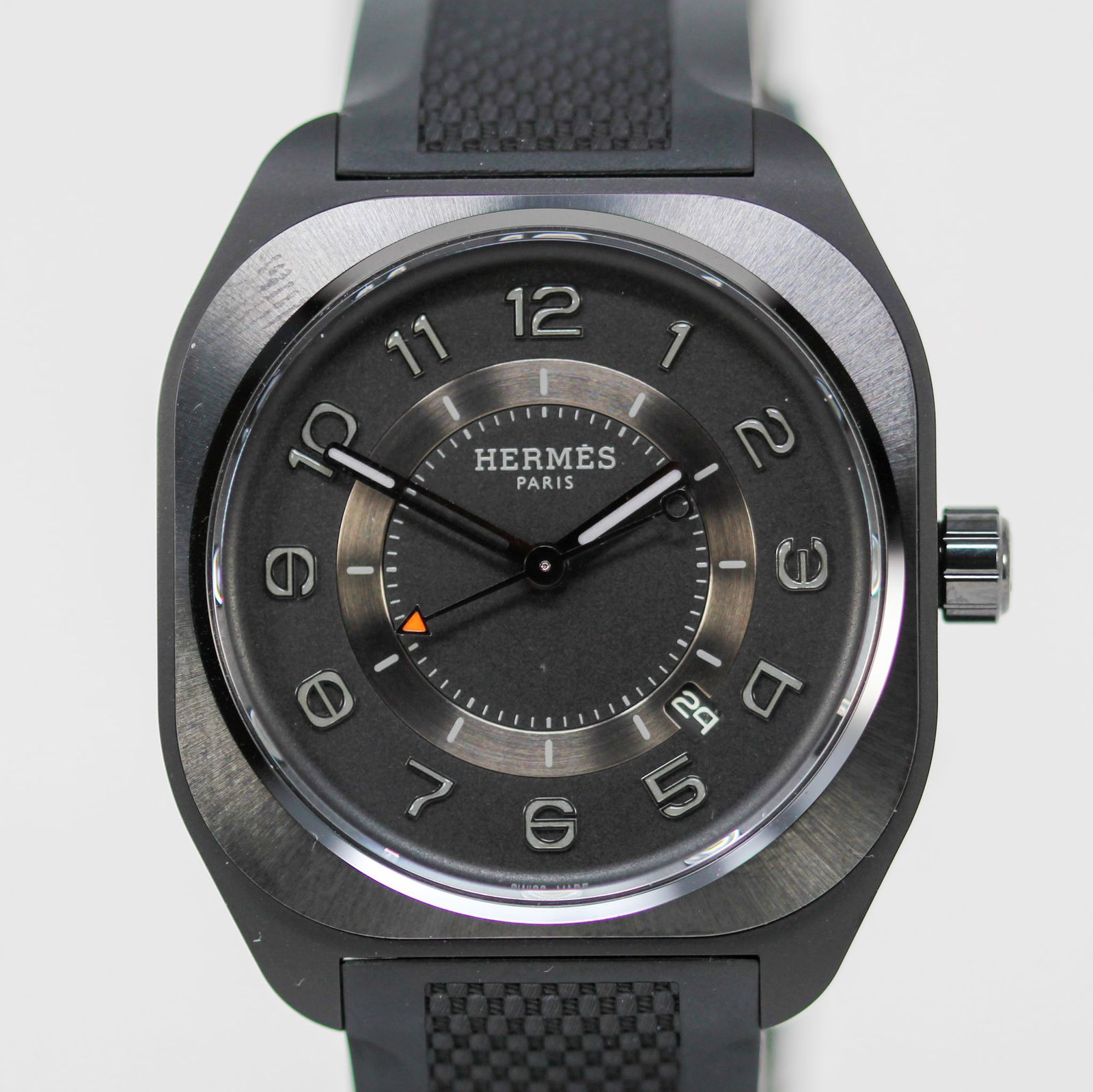 Hermes Paris with Date Wristwatch in Titanium with Hermes Box, Hermes Owner's Manual, and Hermes: Titanium Hermes Paris with Date Wristwatch on Rubber Hermes Strap with Hermes Box, Hermes Owner's Manual, and Hermes Guaranty; Ref SP1.742, Serial # 3673946. 39mm diameter. Running at time of catalogi