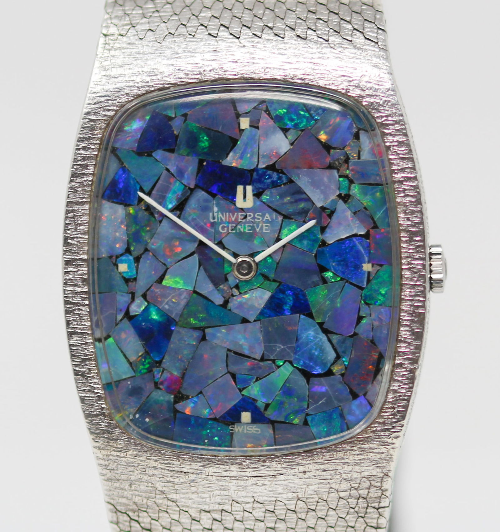 Vintage Universal Geneve Shadow Wristwatch: Stainless Steel Vintage Universal Geneve Shadow Wristwatch on Integrated Stainless Steel Bracelet. 30mm diameter. Running at time of cataloging. PLEASE NOTE: all wristwatches are sold "as-is", with no