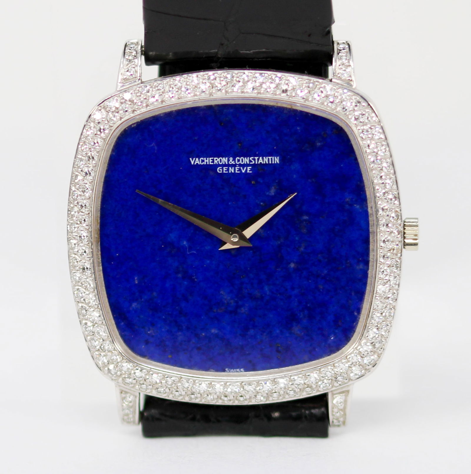 Vintage Vacheron & Constantin Geneve Wristwatch with Factory Diamond Bezel in 18k White Gold: 18k White Gold Vintage Vacheron & Constantin Geneve Wristwatch with Factory Diamond Bezel on Vacheron & Constantin Leather Strap; Serial # 483413. 30mm diameter. Running at time of cataloging. PLEASE