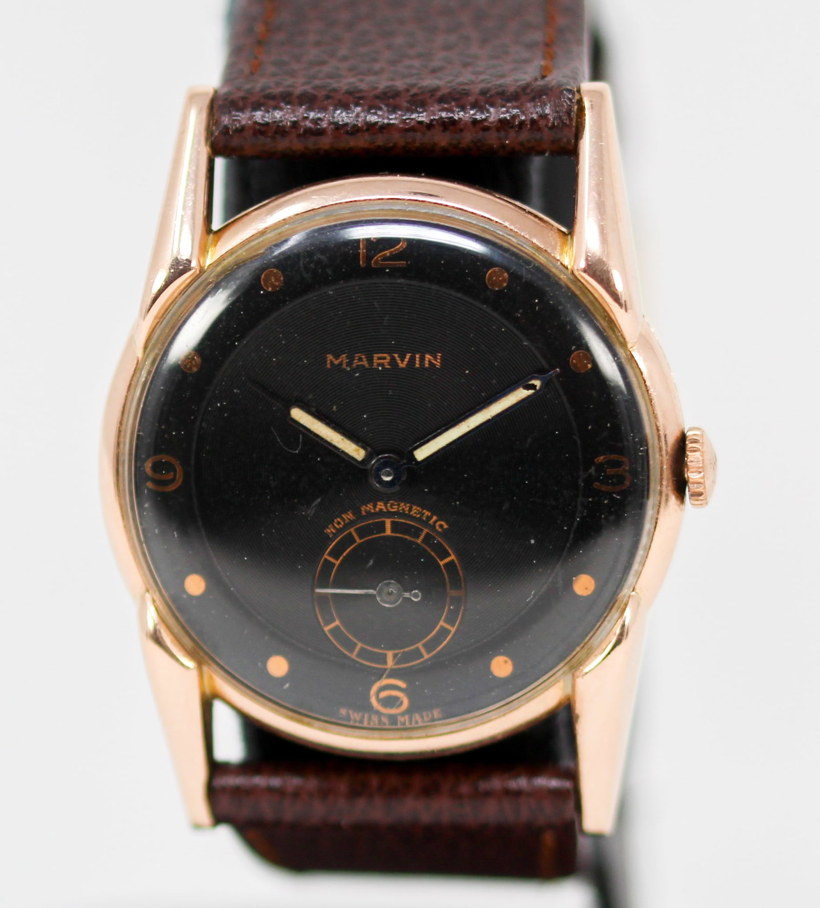 Vintage Marvin Wristwatch in 14k Rose Gold: 14k Rose Gold Vintage Marvin Wristwatch; Serial # 0520037/21. 32mm diameter. Running at time of cataloging. PLEASE NOTE: all wristwatches are sold "as-is", with no mechanical warranty or guarantee. An