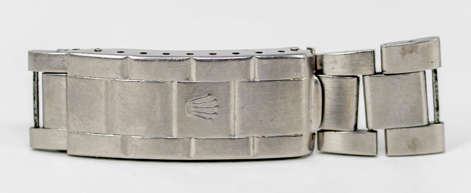 Loose Stainless Steel Partial Rolex Bracelet: Loose Stainless Steel Partial Rolex Bracelet; # 471. 2.5" length, 19mm end link. Loose watch parts. PLEASE NOTE: all wristwatches are sold "as-is", with no mechanical warranty or guarantee. Any repres
