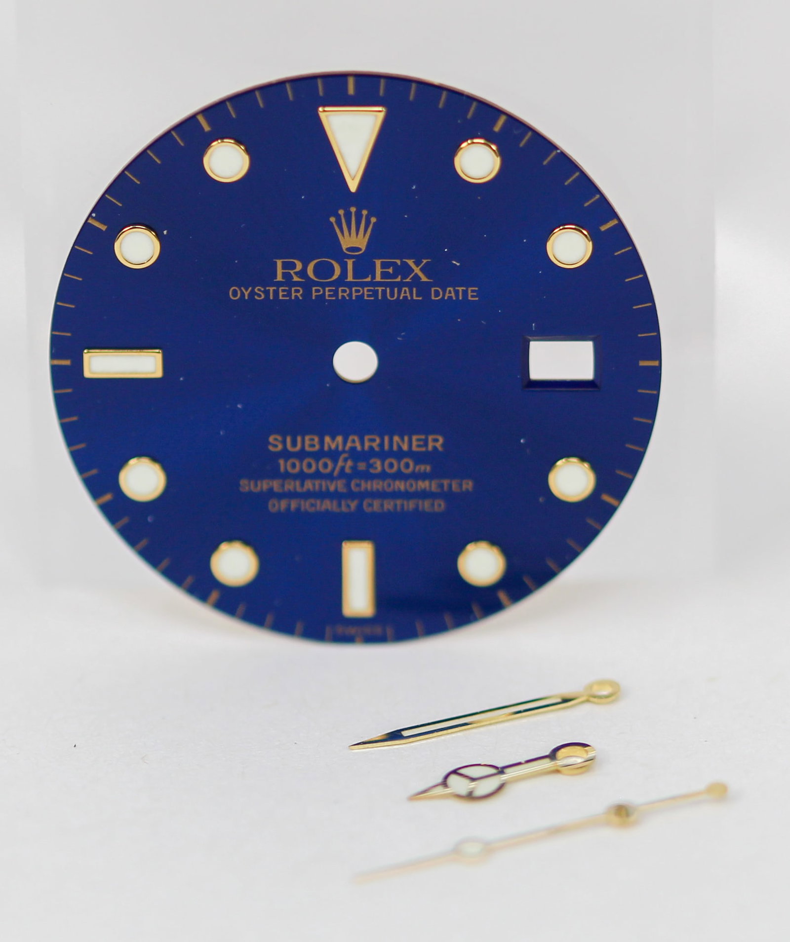 Loose Vintage Rolex Oyster Perpetual Date Submariner Dial and Loose Rolex Watch Hands: Loose Vintage Rolex Oyster Perpetual Date Submariner Dial and Loose Rolex Watch Hands. Blue dial. Gold watch hands. 27mm diameter. Loose watch parts. PLEASE NOTE: all wristwatches are sold "as-is", wi