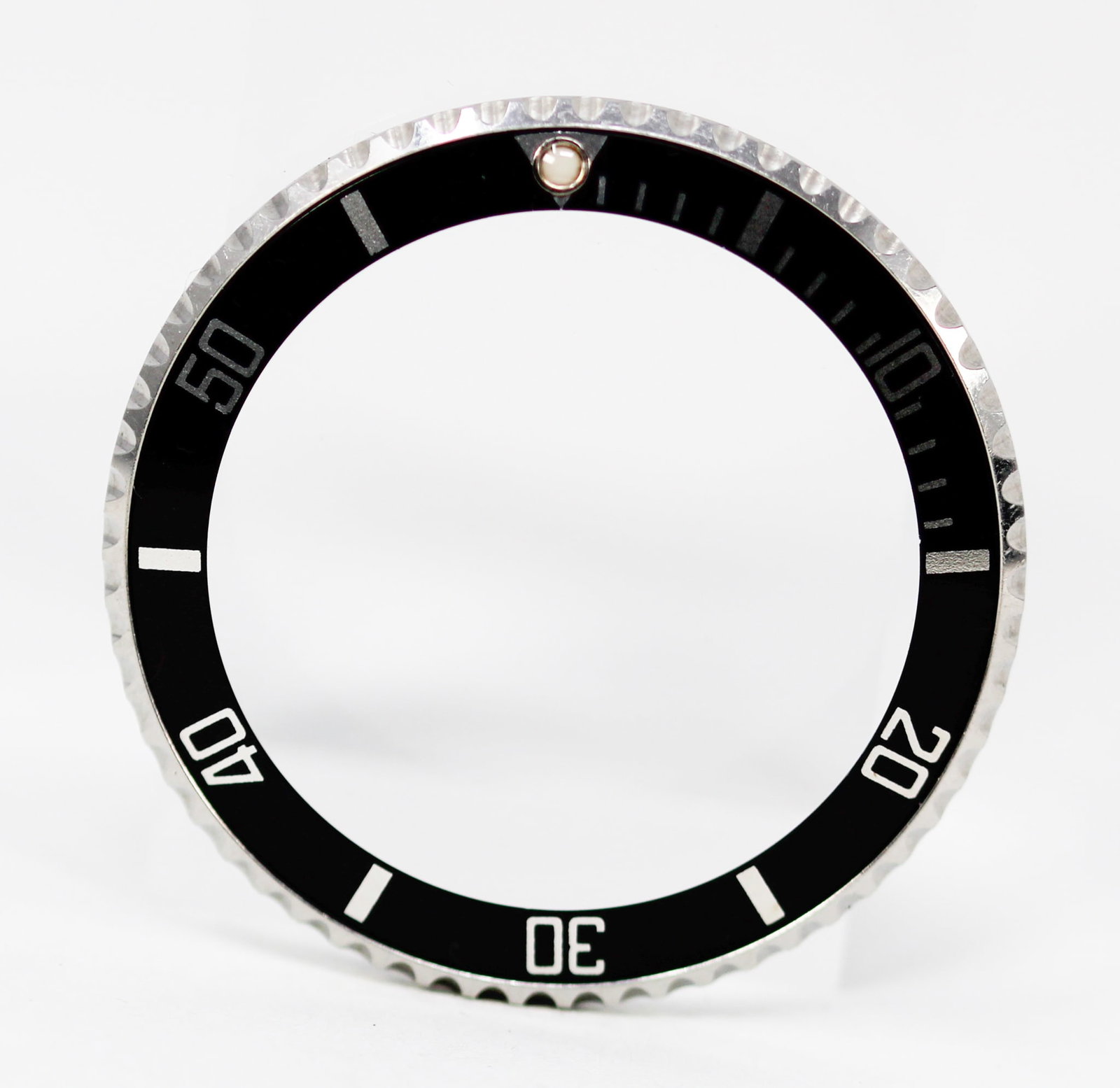 Loose Vintage Rolex Submariner Bezel: Loose Vintage Rolex Submariner Bezel. Black bezel. 39mm diameter. Loose watch parts. PLEASE NOTE: all wristwatches are sold "as-is", with no mechanical warranty or guarantee. Any representation as to 