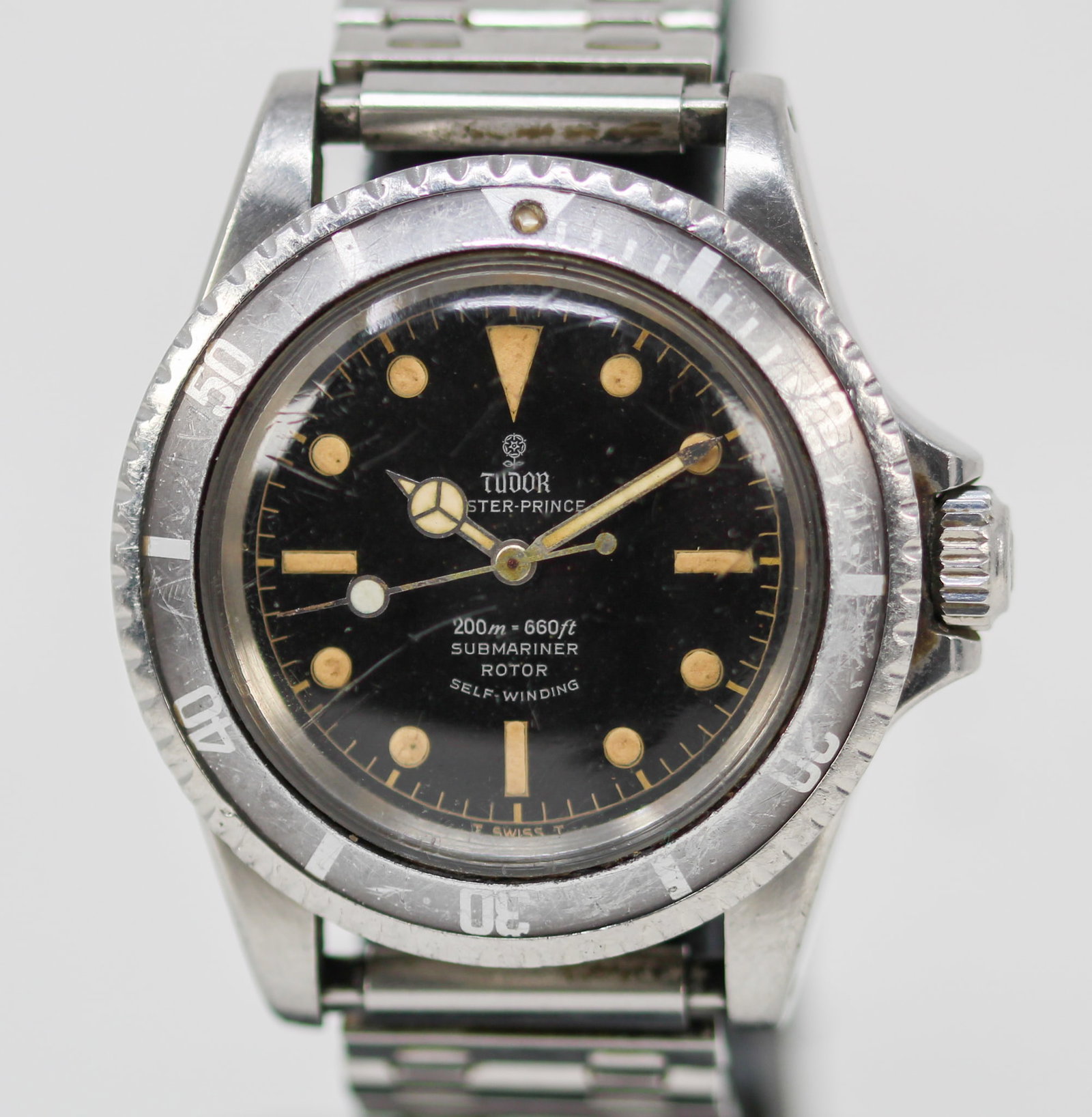 Vintage Tudor Oyster Prince Submariner Wristwatch *Serial # No Longer Visible*: Stainless Steel Vintage Tudor Oyster Prince Submariner Wristwatch on Aftermarket Stainless Steel Bracelet *Serial # No Longer Visible*; Model 7928, Serial # No Longer Visible. 40mm diameter. Not runni