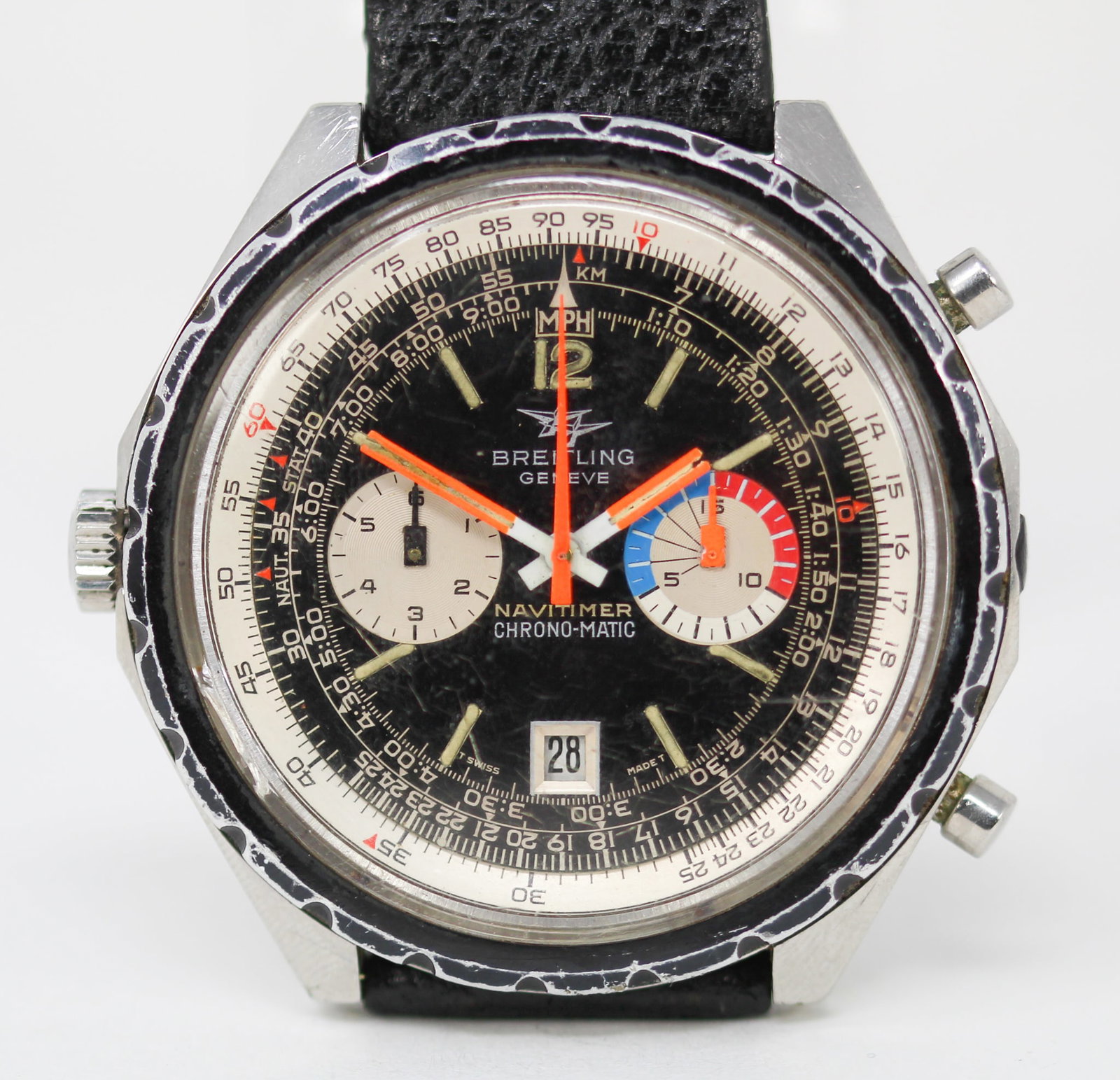 Vintage Breitling Geneve Navitimer Chrono-Matic with Date Wristwatch: Stainless Steel Vintage Breitling Geneve Navitimer Chrono-Matic with Date Wristwatch on Aftermarket Leather Strap; Ref 1810, Serial # 1317334. 48mm diameter. Running at time of cataloging. PLEASE NOTE