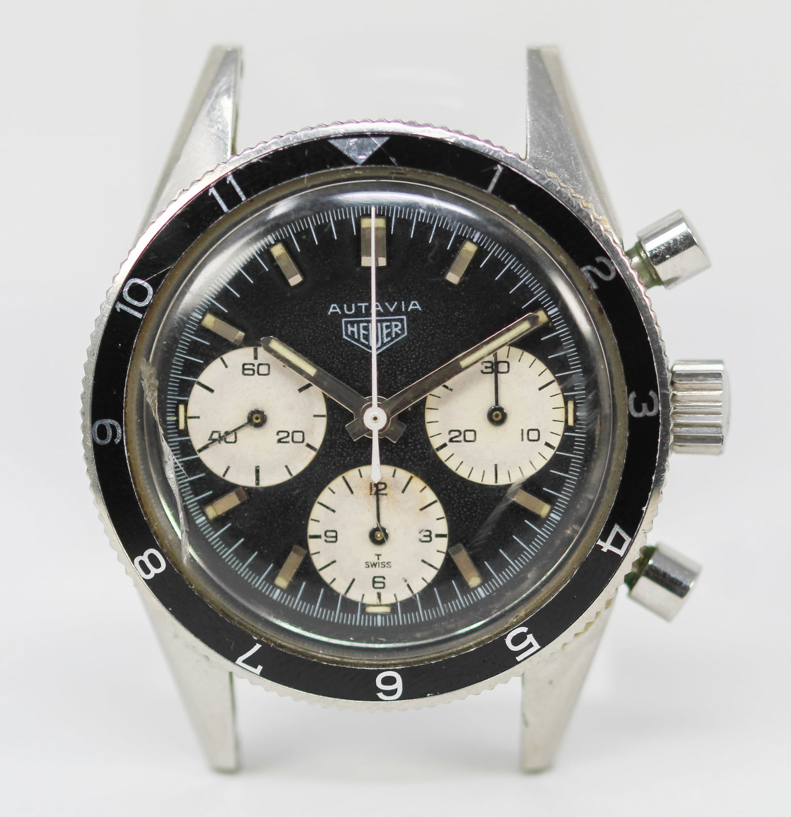Vintage Heuer Autavia Chronograph Wristwatch: Stainless Steel Vintage Heuer Autavia Chronograph Wristwatch; Ref 2446, Serial # 89792. 39mm diameter. Running at time of cataloging. PLEASE NOTE: all wristwatches are sold "as-is", with no