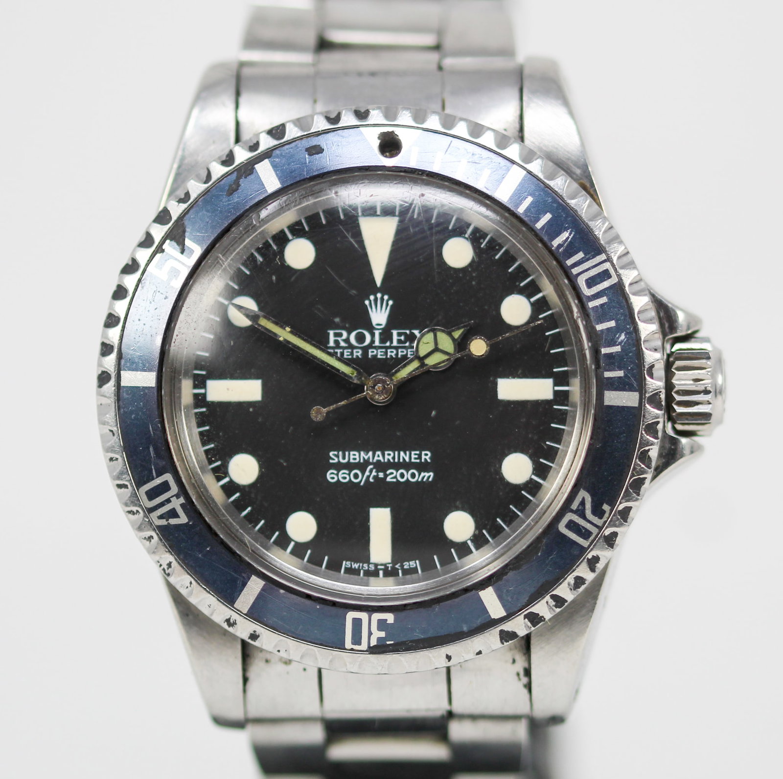 Vintage Rolex Oyster Perpetual Submariner Wristwatch: Stainless Steel Vintage Rolex Oyster Perpetual Submariner Wristwatch on Stainless Steel Rolex Bracelet; Model 5513, Serial # 7416368. 40mm diameter. Running at time of cataloging. PLEASE NOTE: all wri