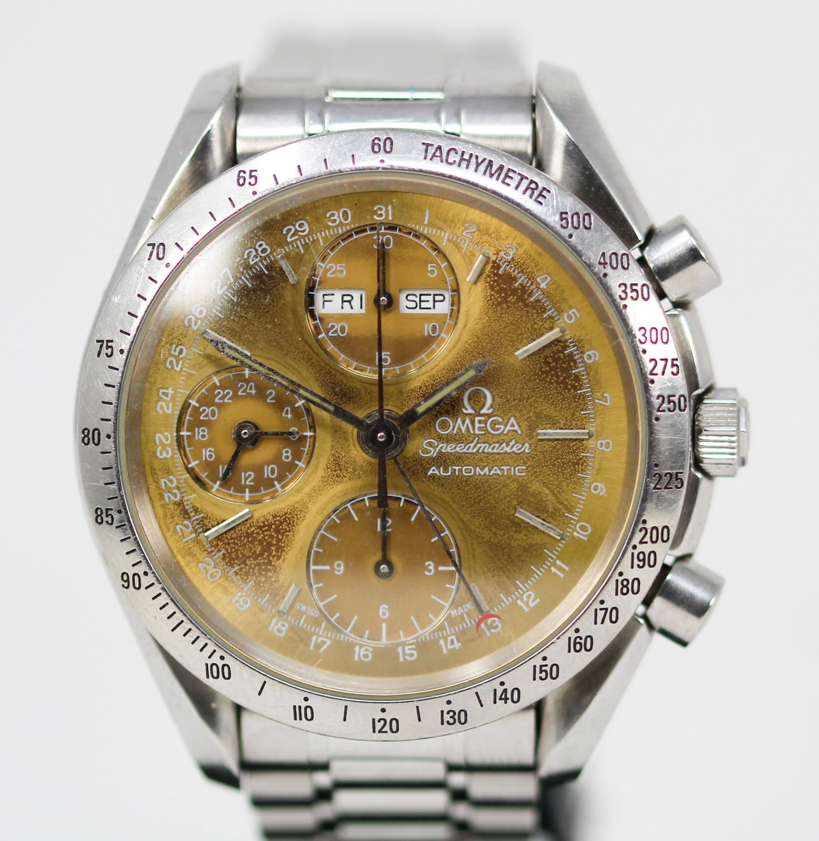 Vintage Omega Speedmaster Automatic Chronograph Wristwatch: Stainless Steel Vintage Omega Speedmaster Automatic Chronograph Wristwatch on Stainless Steel Omega Bracelet; Ref 175.0044/375.0044/175.0054/375.0054, Serial # 55688350. 39mm diameter. Running at time