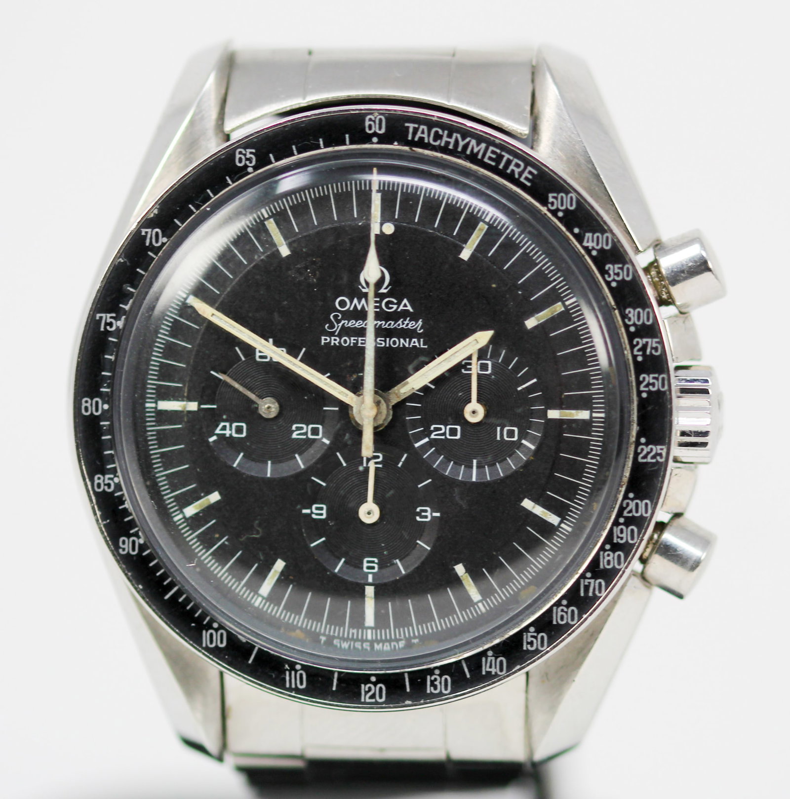 Vintage Omega Speedmaster Professional Chronograph Wristwatch: Stainless Steel Vintage Omega Speedmaster Professional Chronograph Wristwatch on Stainless Steel Omega Bracelet; Ref 145.022-69 ST, Serial # 29608440. 42mm diameter. Running at time of cataloging. PLE