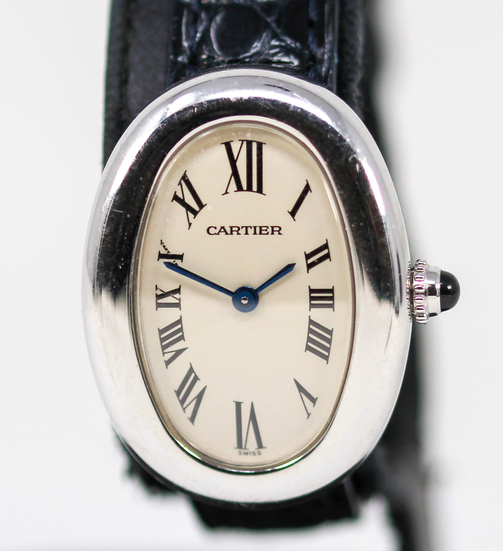 Cartier Baignore Wristwatch on Leather Cartier Strap in 18kt White Gold with Cartier Certificate of: 18kt White Gold Cartier Baignore Wristwatch on Leather Cartier Strap with 18kt White Gold Cartier Buckle with Cartier Certificate of Guaranty; Ref 1955, Serial # 137433CD. 23mm diameter. Running at ti