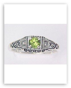 ANTIQUE STYLE STERLING SILVER RING PERIDOT 2 DIAMOND: This Antique Style ring is an Authentic and Accurate copy of a ring from the 1930's and this one is in Mint condition! It is a Solid Sterling Silver ring featuring a round PERIDOT = .15 Carats, with a
