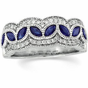 14K WHITE GOLD SAPPHIRE DIAMOND WEDDING BAND: This 14k White Gold Wedding Band Anniversary Band is set with sparkling round Diamonds combined with stunning Blue Sapphires. The Diamond Total Weight = .33 Carats and the Marquise cut Genuine Blue Sa