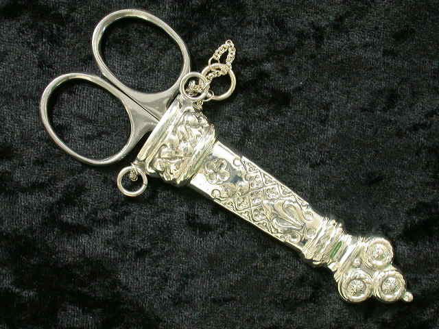ANTIQUE STYLE STERLING SCISSORS SEW: Antique Style Sterling Silver SEWING scissors holder with ornate scrollwork. Scissors included (not sterling).