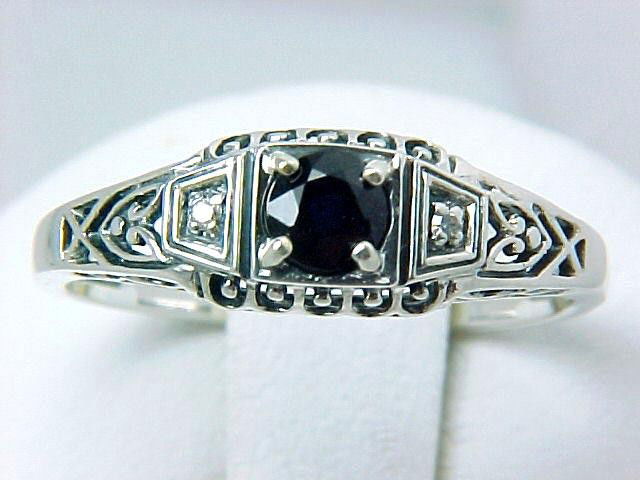 ANTIQUE STYLE STERLING RING SAPPHIRE DIAMOND FILIGREE!: Vintage Style Sterling Silver ring featuring a round GENUINE BLUE SAPPHIRE = .15 Carats, with a DIAMOND set each side. The Sapphire and Diamonds are surrounded by exquisite filigree work.