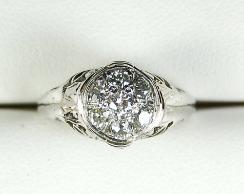ANTIQUE 18K WHITE GOLD RING 7 DIAMOND ENGAGEMENT?: Antique 18k White Gold Ring featuring a cluster of 7 Mine Cut DIAMONDS with an approximate Total Weight = .50 CARATS! (There is a chip on one of the Diamonds) This ring might have been worn as an Anti