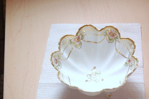 HAND PAINTED BOWL NIPPON INITIAL M: This Vintage dish measures 5 1/2 inches across and it is 2 7/8 inches across. The beautiful scalloped edge is trilled in Gold and the flowers are Green and Pink on a white background. The bottom of th