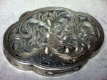 ANTIQUE ART NOUVEAU 800 SILVER COMPACT CHASING MIRRO: This Antique ART NOUVEAU Compact is 800 SILVER. The hinged clam shaped compact features stunning chasing and engraving. It measures 3.5 x 2.5 inches and it is fitted with a beveled mirror.