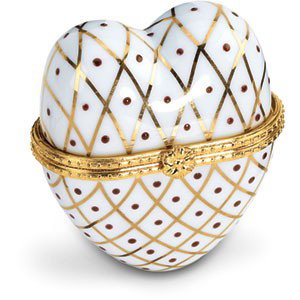 JEWELRY BOX HEART PORCELAIN WHITE GOLD ENAMEL: This HEART Shaped Porcelain Jewelry Box is enamelled in White with Gold accents. The Heart Box is hinged and opens to hold a ring or pair of Earrings. This stunning Jewelry Box measures 64mm x 75mm (2