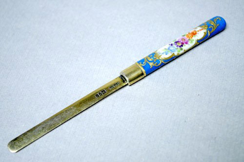 ANTIQUE LETTER OPENER MEISSEN PORCELAIN LONDON 1901: This ANTIQUE Letter Opener is from London and it is Circa 1901. There is beautiful Hallmarking on one side of the Silver Gilt Letter Opener. It features a magnificent Meissen Porcelain handle with exq