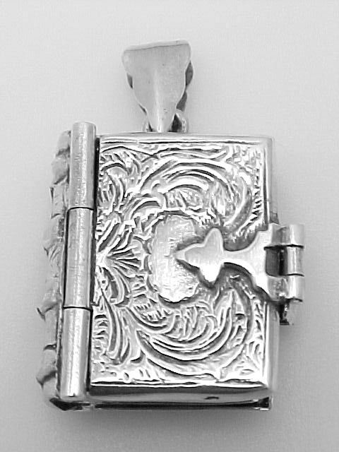 ANTIQUE STERLING SILVER LOCKET PENDANT BOOK: This Antique Style BOOK LOCKET is an Authentic and Accurate copy of a Locket from the 1920'S, and this one is in MINT condition. It is SOLID STERLING SILVER and it looks like a beautiful Antique Book.