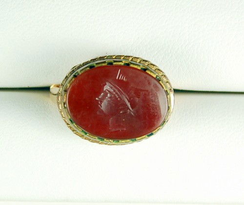 ANTIQUE GOLD SEAL RING CARNELIAN INTAGLIO PROFILE MAN: Antique GOLD Seal Ring featuring an Oval CARNELIAN with an Intaglio of a man inf profile. The Carnelian measures approximately 3/4 inch x 1/2 inch. The ring is a Size 6 and there is a ring guard on th
