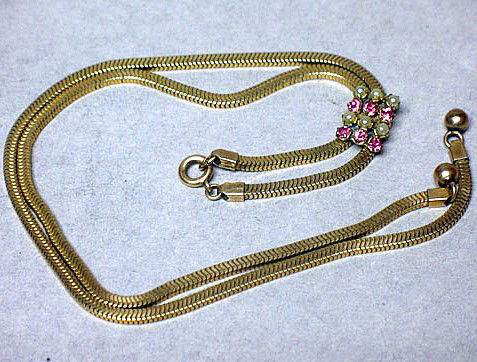 ANTIQUE SLIDE CHAIN GOLD FILLED PEARL ART DECO NECKLACE: This ANTIQUE Art Deco SLIDE CHAIN Necklace is circa 1935. It is 12K GOLD FILLED and it is 20 inches in length. The rectangular SLIDE measures 1/2 inch x 3/8 inch and it is set with Pink colored stones
