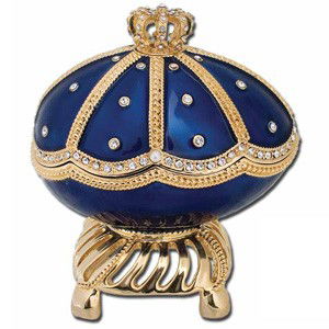 MUSIC BOX SWAN LAKE JEWELRY BOX EGG BLUE: This Majestic EGG in Blue is a Music Box as well as a Jewelry Box. It measures 3 3/4 inches x 2 1/2 inches x 4 1/4 inches and the inside is lined in blue velvet. The Music played is Swan Lake.