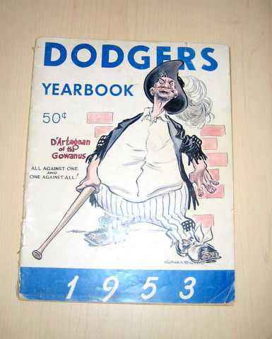 1953 BROOKLYN DODGER YEARBOOK ORIGINAL: This ORIGINAL 1953 Brooklyn DODGERS YEARBOOK is in Very Good Condition. The drawing on the cover is by Willard Mullin and it features the 'Bum Drawing'. The pages are browned but are not at all brittl