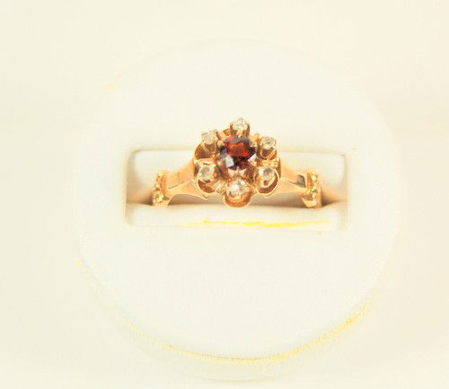 VICTORIAN ANTIQUE GOLD RING GARNET ROSE CUT DIAMOND: This ANTIQUE VICTORIAN Ring is Circa 1900. It is 10k GOLD and it features a Genuine GARNET surrounded by 6 ROSE CUT DIAMONDS. This ring is now a size 6.5 but it can be resized.