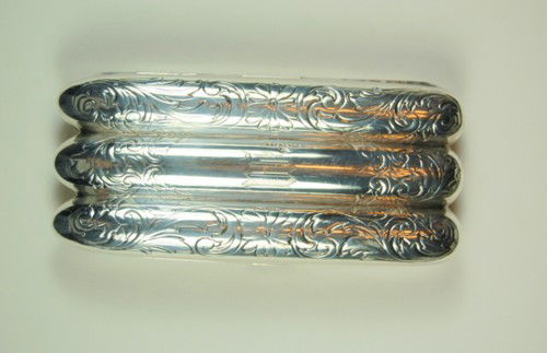 ANTIQUE STERLING SILVER CIGAR CASE GOLD WASH INSIDE: This is an ANTIQUE CIGAR HOLDER for 3 Cigars. It is SOLID STERLING SILVER, and it measures approximately 5 inches x 2 1/4 inches, and it HAS magnificent engraving. The inside of the cigar holder is GO