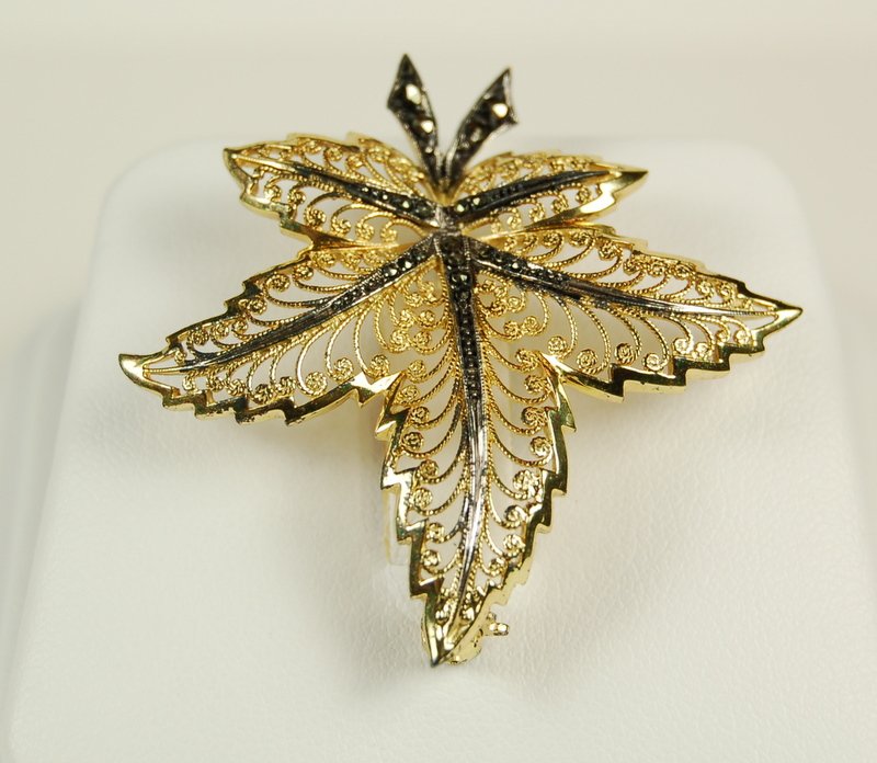 VINTAGE PIN STERLING SILVER SIGNED ALICE CAVINESS LEAF: This is a Vintage STERLING SILVER Gold Pin by world Famous German designer ALICE CAVINESS. This is a GOLD washed Pin of a Maple Leaf and it is set with sparkling MARCASITES. This pin measures 1.75 inc
