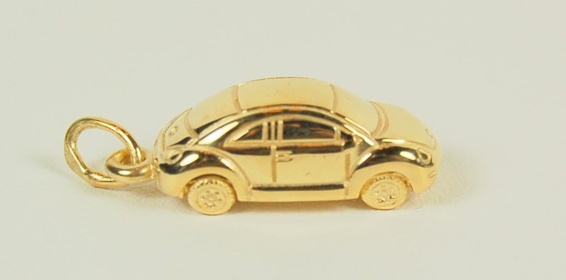 14K SOLID GOLD CAR PENDANT or CHARM 3.4 GRAMS!: 14K Yellow SOLID GOLD CAR Pendant (or you can wear as a Charm). This wonderful Punch Bug Volkswagen CAR with excellent detail measures 3/4 inch in length.