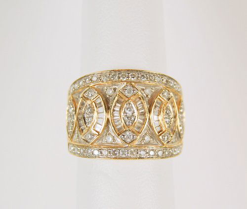 ESTATE 14K GOLD DIAMOND WEDDING BAND WIDE 1.25 CTS!: This Estate 14k Yellow Gold Wedding Band features approximately 55 round DIAMONDS and 30 Baguette DIAMONDS! The Diamond Total Weight is approximately 1.25 CARATS! This Wedding Band is a Size 6 1/2 and