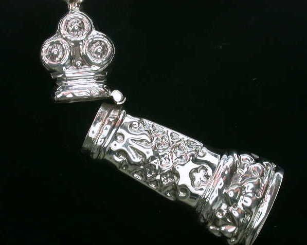ANTIQUE STYLE STERLING SILVER NEEDLECASE SEW SEWING: Antique Style Sterling Silver Needlecase for sewing. It is 2 1/4" long and 3/4 inch wide. There is a loop at the top so you can wear it as a Pendant on a chain, or on a Chatelaine.