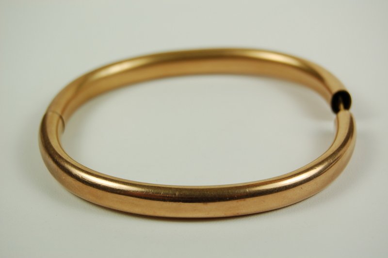 ANTIQUE GOLD FILLED BANGLE BRACELET 7MM WIDE OPENS: This ANTIQUE GOLD FILLED BANGLE BRACELET opens so it can easily be put on. This Antique Bracelet is 7mm wide, and the inside diameter is 2 1/2 inches.