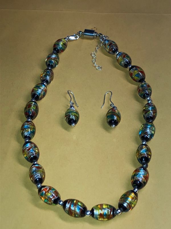 Vintage Murano Bead Sterling Silver Necklace 16-18”: Vintage Murano Bead Sterling Silver Necklace 16-18Â” with Matching Earrings In Never Worn Condition Preowned From an Estate. No Reserve Bid & No Buyers Premium. Shipping $5.00 Payment Forms Accepte