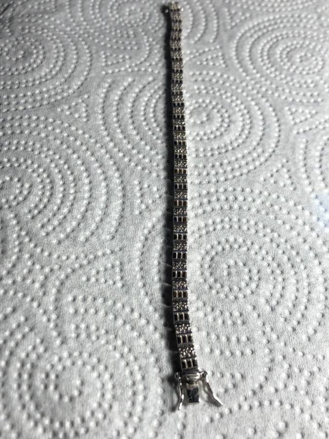 Sterling Silver CZ Tennis Bracelet 7" Preowned...: Sterling Silver CZ Tennis Bracelet 7" Preowned from an Estate. (White Color Silver) Shipping $5.00