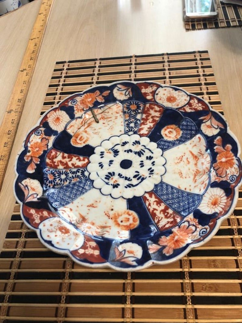Antique Early Dynasty Imari 11” Diameter Stapled Plate: Antique Early Dynasty Imari 11” Diameter Stapled Plate as Pictured. No Reserve Bid & No Buyers Premium. Domestic Shipping $15.00
