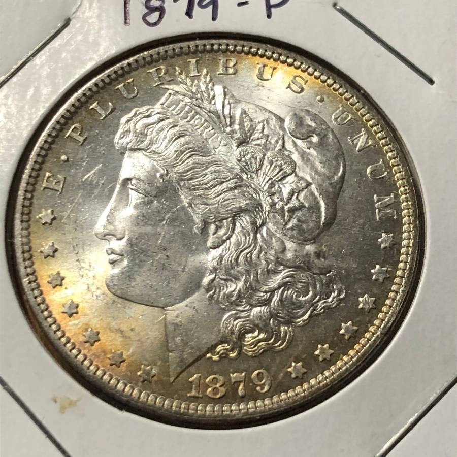 1879-P CHOICE BU GOLDEN TONED ACCENTS MORGAN SILVER... (1 of 2)
