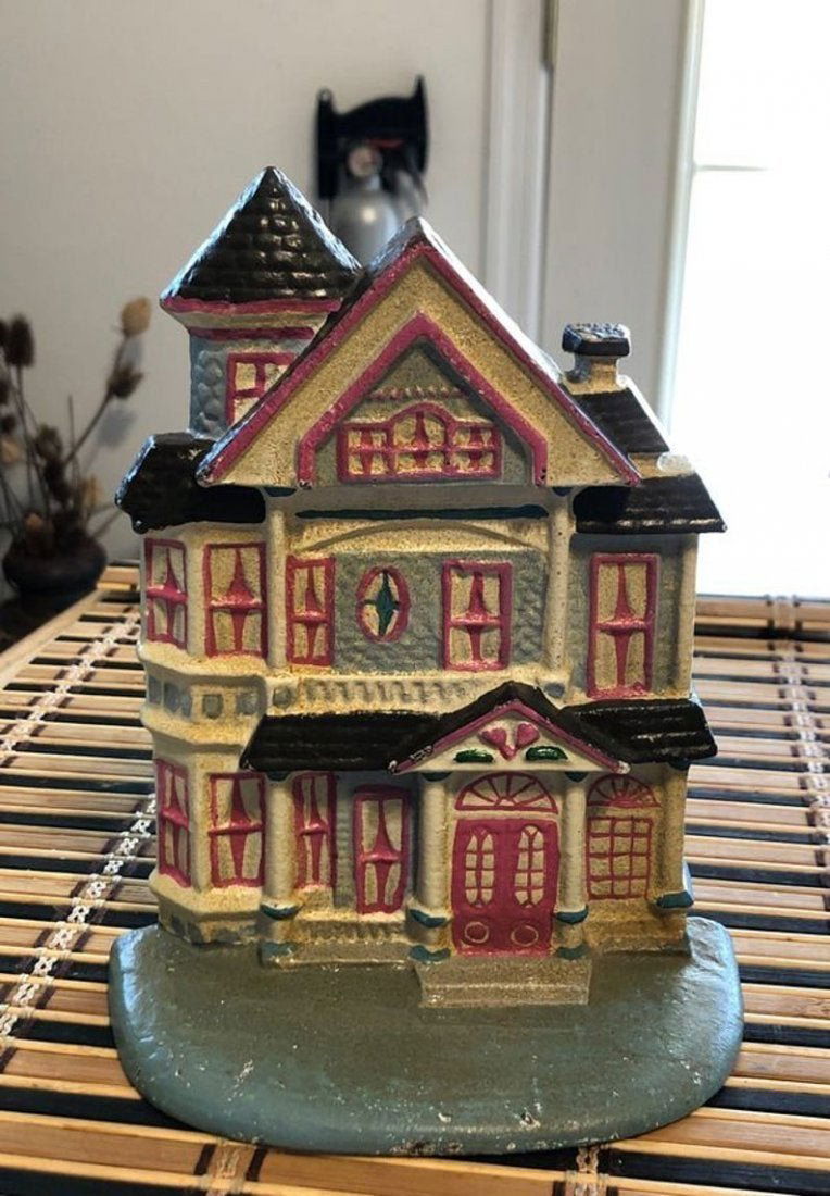 Vintage Victorian Home 7-1/4” Tall Cast Iron Door Stop. (1 of 4)