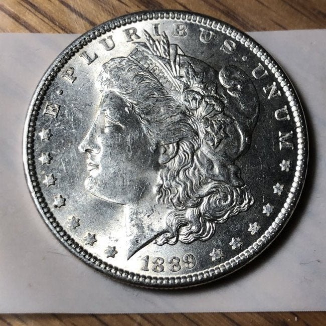 1889-P Uncirculated Condition Morgan Silver Dollar... (1 of 2)