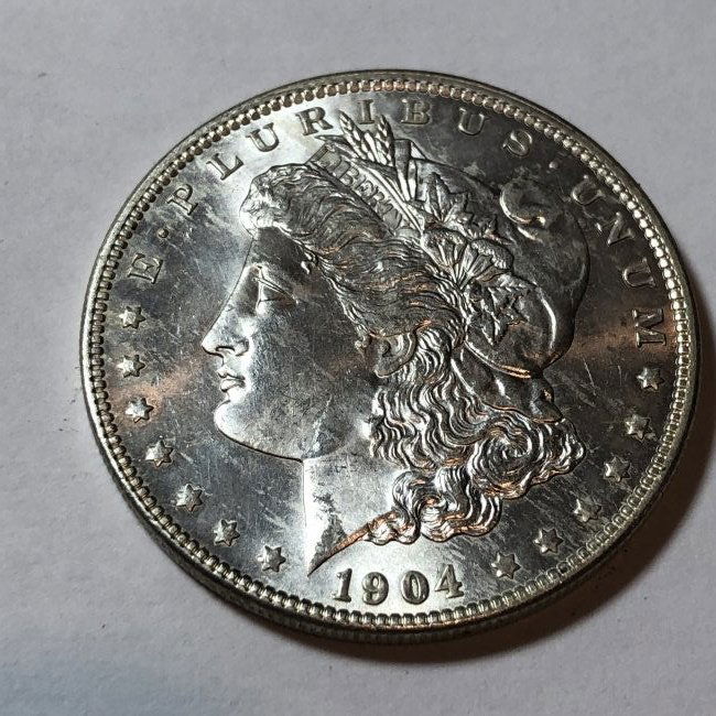 1904-O BU MORGAN SILVER DOLLAR AS PICTURED... (1 of 2)