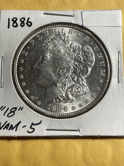 1886-P BU CONDITION MORGAN SILVER DOLLAR AS PICTURED. (1 of 2)